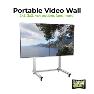 4 monitor video wall arranged 2x2 with 4 55' video monitors on a portable stand with wheels
